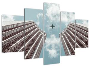 Slika aviona između zgrada (150x105 cm)