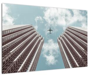 Slika aviona između zgrada (90x60 cm)