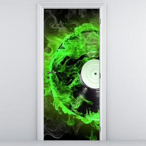 Foto tapeta za vrata - zeleni CD koji gori (95x205cm)