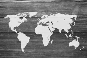 Slika crno-bijeli zemljovid svijeta s drvenom pozadinom