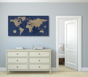 Slika zemljovid svijeta s kompasom u retro stilu na plavoj pozadini