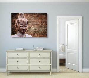 Slika kip Buddhe na drvenoj pozadini