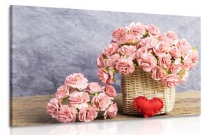 Slika buket ružičastih karanfila u košari