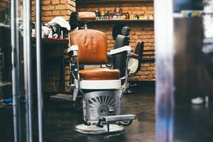 Fotografija Stylish Vintage Barber Chair In brick, stefanamer