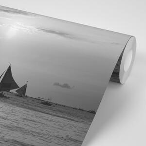 Fototapeta zalazak sunca na moru u crno-bijelom dizajnu