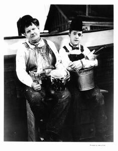 Fotografija Oliver Hardy And Stan Laurel In 'Towed In A Hole', Archive Photos