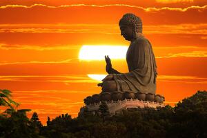 Tapeta kip Buddhe pri zalasku sunca