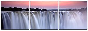 Slika na platnu - Vodopad obojen zalaskom sunca - panorama 5227B (150x50 cm)
