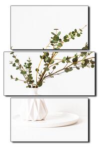 Slika na platnu - Grana eukaliptusa u bijeloj vazi na bijeloj pozadini - pravokutnik 7272C (90x60 cm)