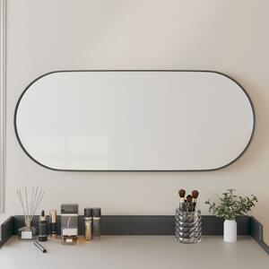 VidaXL Zidno ogledalo crno 25x60 cm ovalno