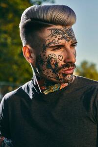 Umjetnička fotografija Portrait of tattooed young man outdoors, Westend61, (26.7 x 40 cm)