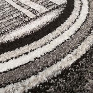 Moderni sivo-smeđi tepih s apstraktnim uzorkom krugova Širina: 120 cm | Duljina: 170 cm