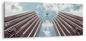 Slika aviona između zgrada (120x50 cm)