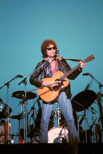 Fotografija Writer composer Bob Dylan at a concert in the early 1980s