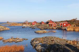 Fotografija Small cottages in autumn i archipelago, Anders Sellin