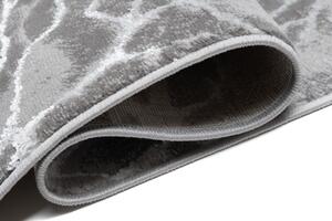 Jednostavan moderan tepih u sivoj boji s bijelim motivom Širina: 140 cm | Duljina: 200 cm