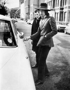 Fotografija Jagger, singer with the Rolling Stones, about to get into his car, c.1970