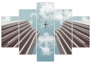 Slika aviona između zgrada (150x105 cm)