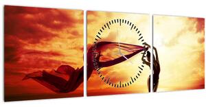 Slika - Silhueta ženske ob sončnem zahodu (sa satom) (90x30 cm)