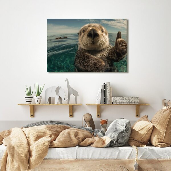 Slika razigrana vidra u oceanu