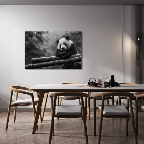 Slika panda odmara na bambusu