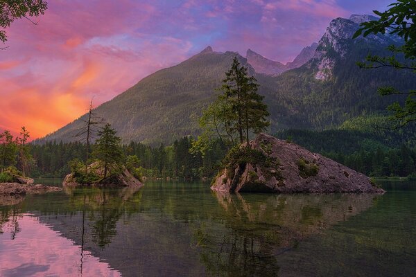 Fototapeta zalazak sunca nad planinskim krajolikom