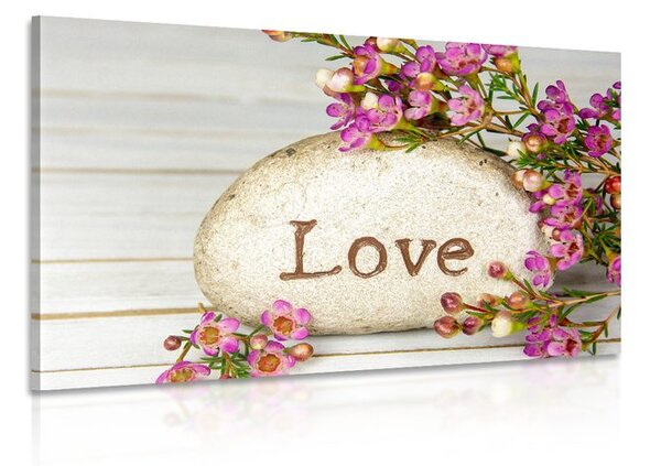 Slika s natpisom na kamenu Love