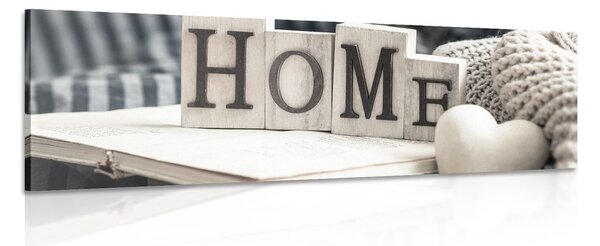 Slika s natpisom Home i mrtvom prirodom
