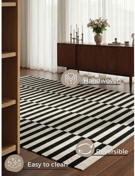 Crno-bijeli obostrani/ručno rađen vuneni tepih 200x300 cm Donna – Hanse Home