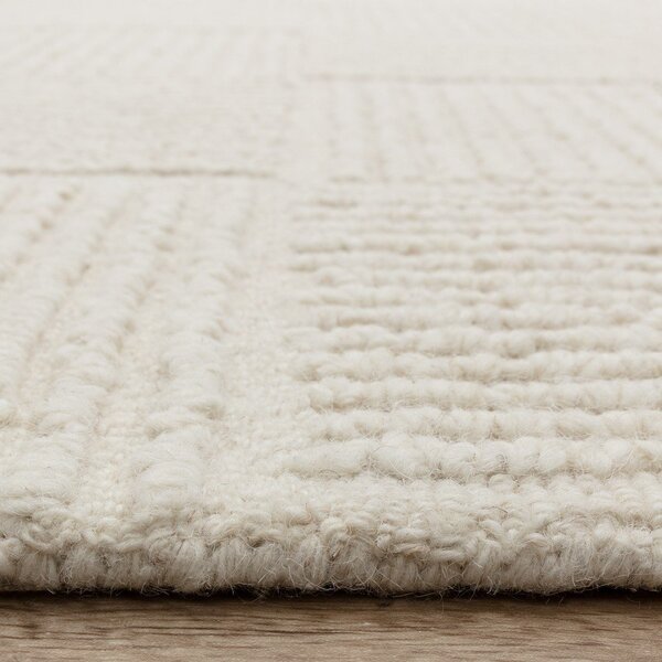 Ručno rađen vunen tepih boje slonovače 120x170 cm Zennith Grid – Asiatic Carpets