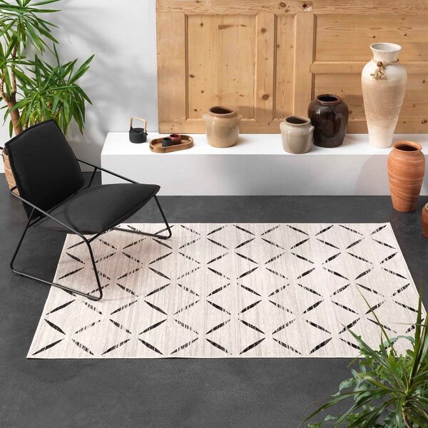 Bež tepih od mješavine pamuka 68x110 cm Modesto – douceur d'intérieur