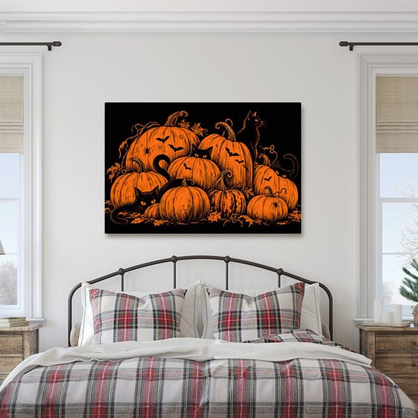 Slika halloween bundeve s crnim mačkama