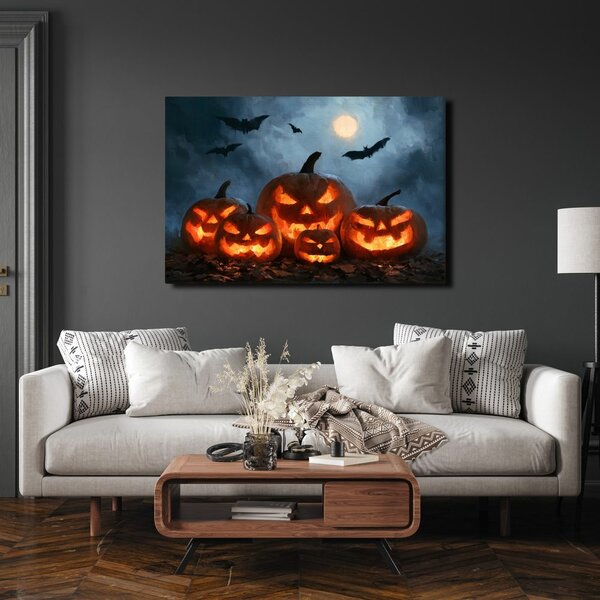 Slika halloweenske bundeve pod šišmišima