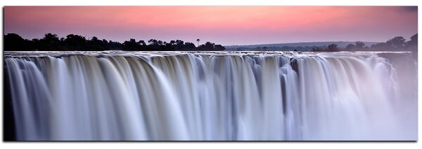 Slika na platnu - Vodopad obojen zalaskom sunca - panorama 5227A (105x35 cm)
