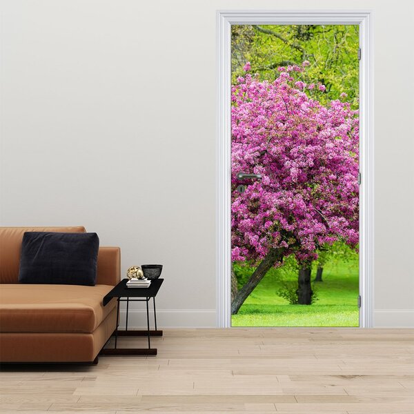 Foto tapeta za vrata - Cvjetajuće stablo na livadi (95x205cm)