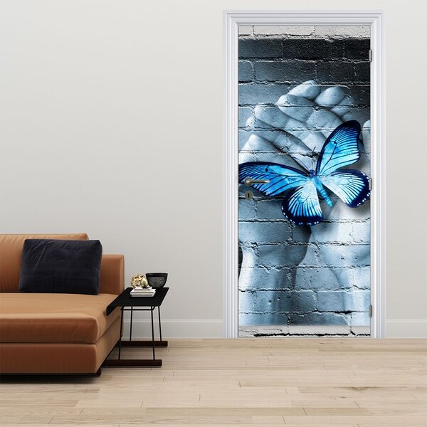 Foto tapeta za vrata - Plavi leptir na zidu (95x205cm)