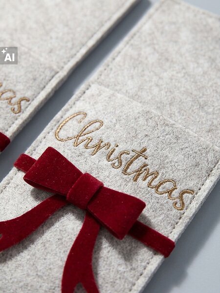 Sinsay - Božićna navlaka za pribor za jelo s mašnom i natpisom Christmas
