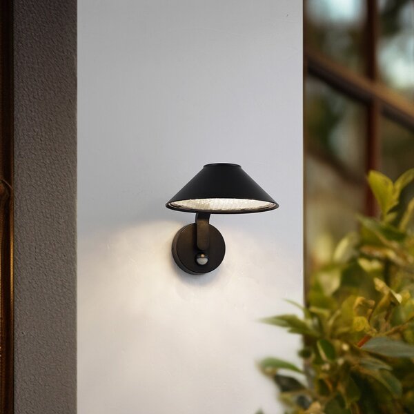 Lindby LED zidna lampa Capelo, crna, metalna, senzorska, Ø20cm, Crno, Aluminij