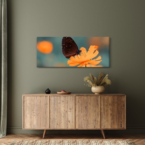 Slika - leptir na narančastom cvijetu (120x50 cm)