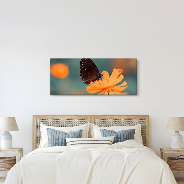 Slika - leptir na narančastom cvijetu (120x50 cm)