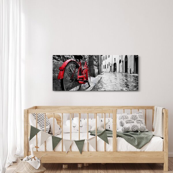 Slika rdečega kolesa na tlakovani ulici (120x50 cm)