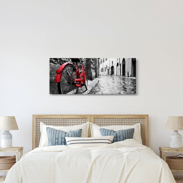 Slika rdečega kolesa na tlakovani ulici (120x50 cm)