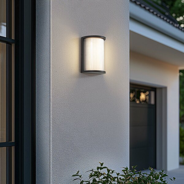 Lindby LED vanjska zidna svjetiljka Calvik, crna, rebrasta, IP44, Crno, Metal