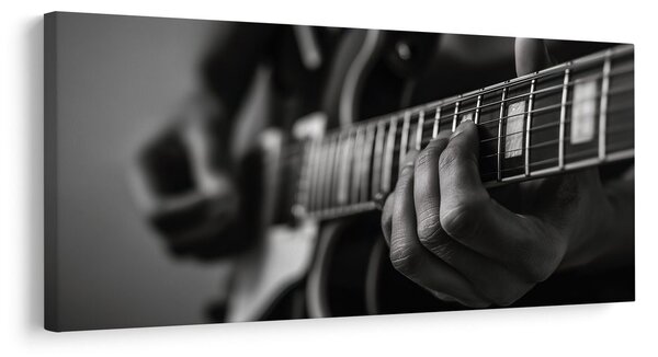 Slika prsti na žicama gitare