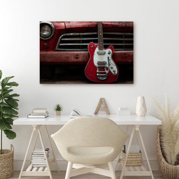 Slika vintage gitara i automobil