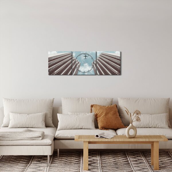 Slika aviona između zgrada (sa satom) (90x30 cm)
