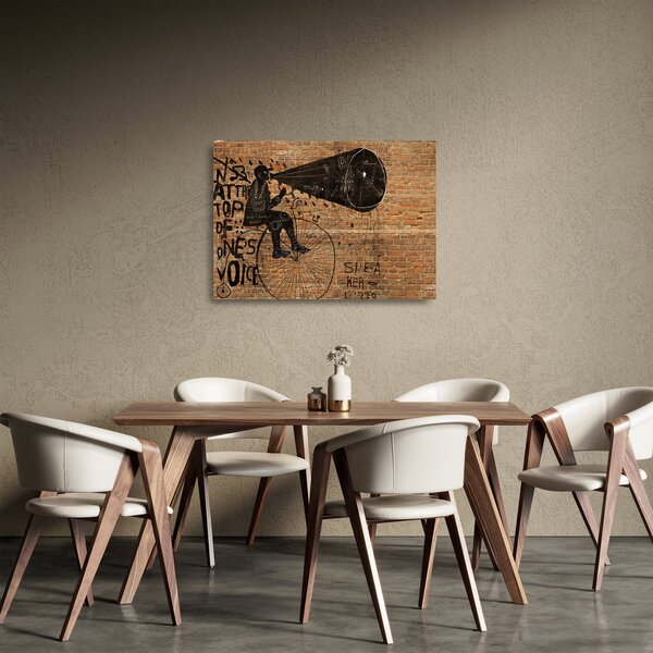 Staklena slika - Moški na kolesu v slogu Banksyja (70x50 cm)