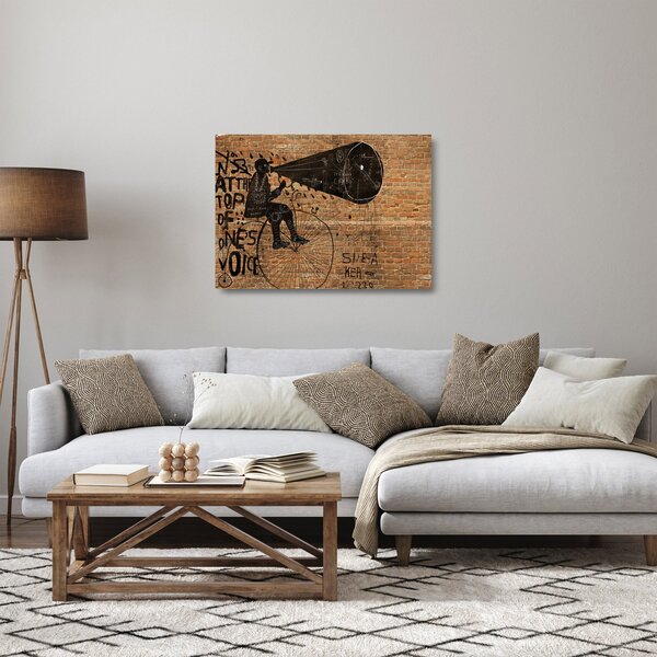 Staklena slika - Moški na kolesu v slogu Banksyja (70x50 cm)