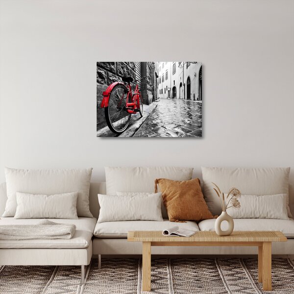 Staklena slika rdečega kolesa na tlakovani ulici (70x50 cm)