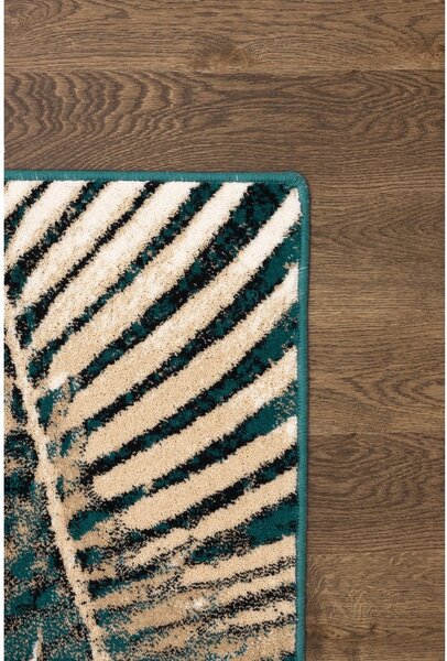 Petrolej zeleni vuneni tepih 133x180 cm Areca – Agnella